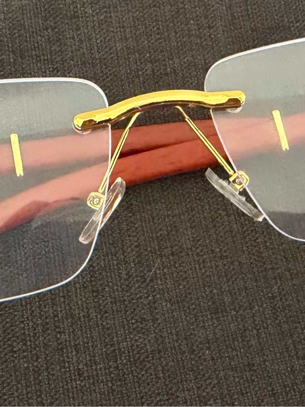Cartier Rimless Men's Glasses with Gold Bridge and Clear Lenses